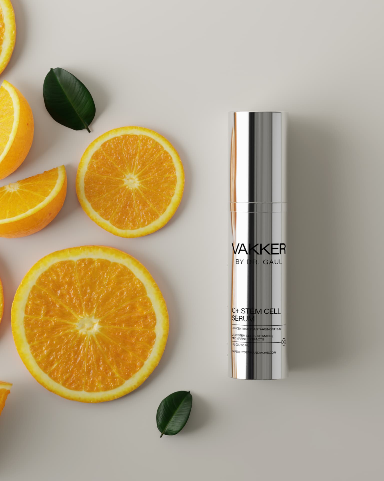 VAKKER by Dr. Gaul C+ stem cell serum with fresh orange slices and green leaves