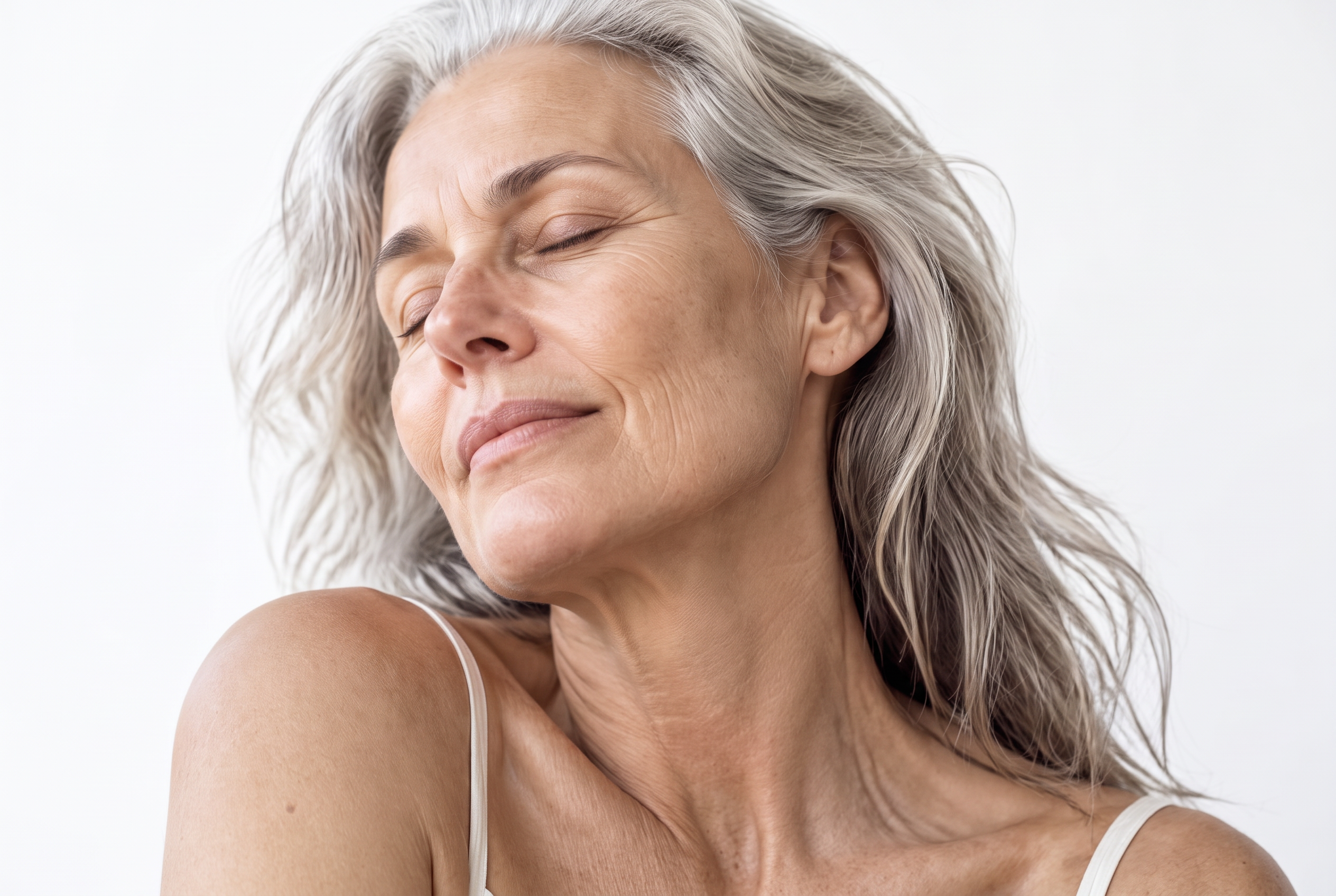 Woman with natural, healthy skin in soft daylight